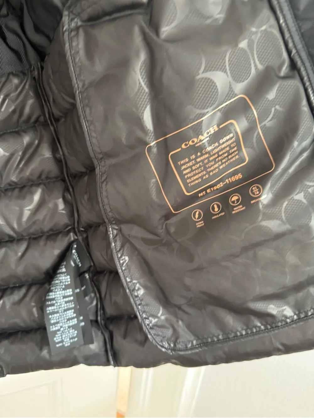 Coach Black Quilted Puffer Jacket with Faux Fur Trim